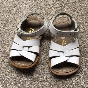 Barely worn white salt water sandals size 3.